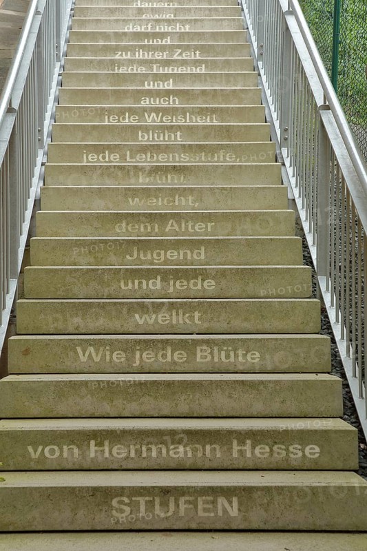 Staircase with poem Steps by Hermann Hesse, staircase with inscription, 'As every flower withers and every youth gives way to age, every stage of life blossoms, every wisdom also blossoms and every virtue in its time and must not last forever...', text, words, literature, poetry, staircase, Biedenkopf, Hesse, Germany, Europe