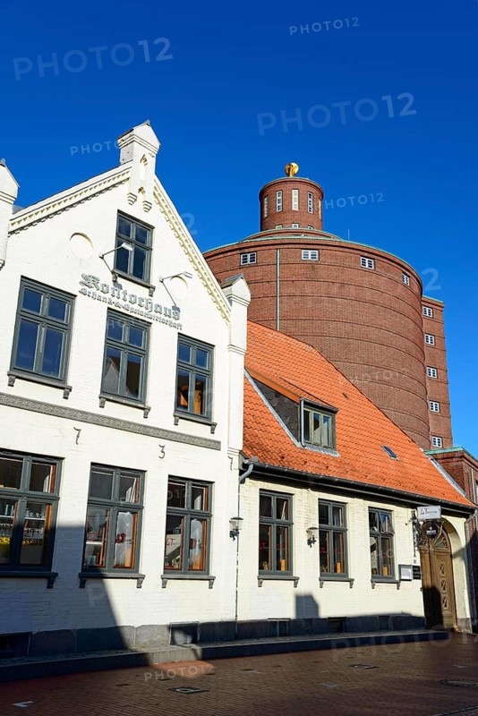 View of a white house with a gabled roof in front of a round tower with a copper dome on a sunny day, Kontorhaus, Kontorgebäude, cultural monument, and historic granary, Eckernförde, Schleswig-Holstein, Germany, Europe