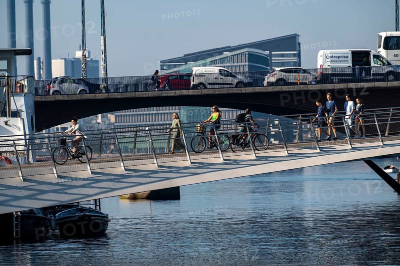 Cyclists on the Lille Langebro cycle and pedestrian bridge over the harbour, Copenhagen is considered the cycling capital of the world, 45% of the population travel by bike, Denmark, Europe