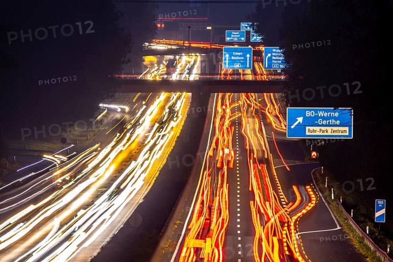 Motorway A40, Ruhrschnellweg, near Bochum, heavy evening traffic, in front of the motorway junction Bochum, A43, view in west direction