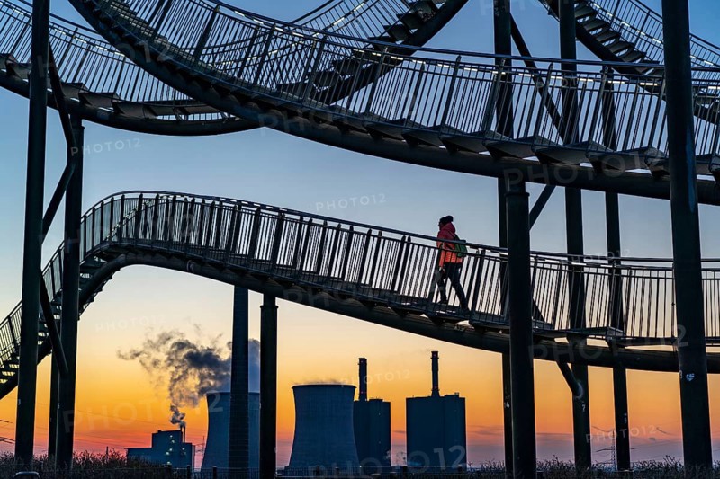 Landmark Angerpark Tiger & Turtle, Magic Mountain, walk-in sculpture in the form of a rollercoaster on the Heinrich-Hildebrand-Höhe spoil tip, HKM steelworks, sunset, Duisburg, North Rhine-Westphalia, Germany, Europe