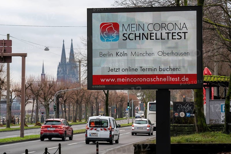 LED billboard, with digital advertising for Corona rapid tests, in the test centre in Cologne, on Konrad-Adenauer-Ufer in Cologne, North Rhine-Westphalia, Germany, Europe