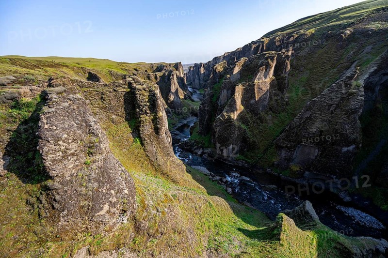 Fjaðrárgljúfur Canyon, Fjadrargljufur, rock formations in rugged deep canyon with river in the evening light, near Kirkjubæjarklaustur, South Iceland, Iceland, Europe