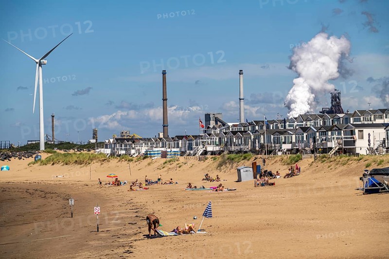 The Tata Steel steel and smelting works in IJmuiden, Velsen, North Holland, Netherlands, largest industrial area in the Netherlands, 2 blast furnaces, 2 coking plants, rolling mills, directly on the North Sea, beach houses near Ijmuiden aan Zee