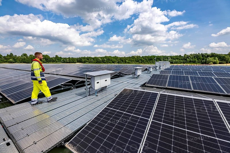 Germany's largest floating solar power plant on the Silbersee III, a quarry pond no longer used for sand mining, near Haltern am See, operated by Quarzwerke GmbH, around 5800 solar modules, on an area of a good 2 football pitches, generate 3.1 megawatts of power, the company uses the electricity itself on weekdays, at weekends it flows into the public grid, North Rhine-Westphalia, Germany, Europe