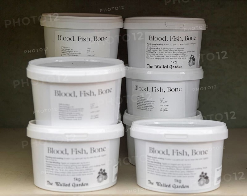 Blood, fish, bone fertilser on sale at The Walled garden plant nursery, Benhall, Suffolk, England, UK