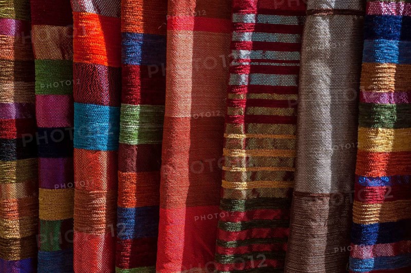 Hand-woven fabrics on the market, shopping, cloth, shawls, arabic, oriental, exotic, colourful, woven, textiles, detail, fabric, trade, bazaar, craft, souvenir, Marrakech