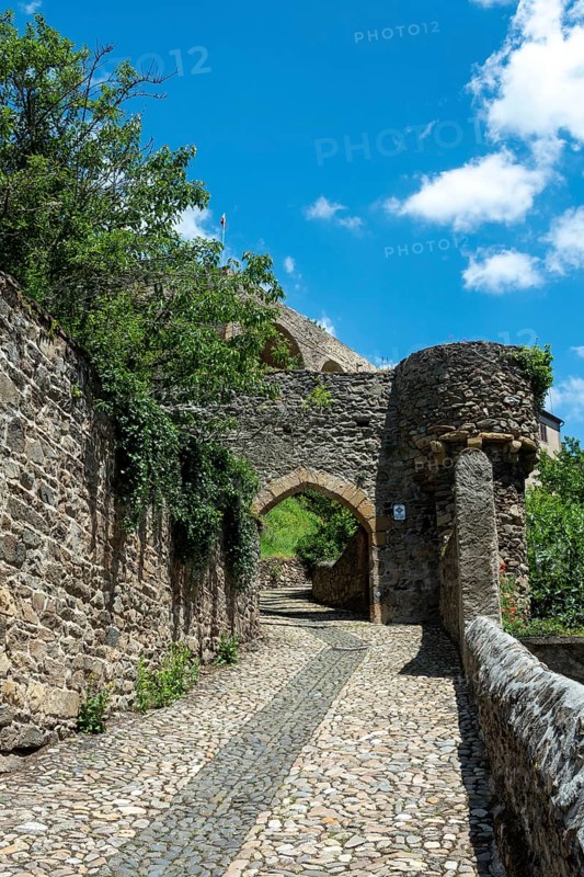Historic gateway (Porte du Brugelet) leading into the medieval city of Auzon in Haute Loire, Auvergne-Rhone-Alpes, France, Europe