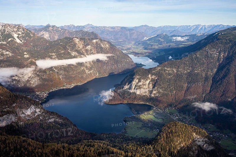 View from the Dachstein Krippenstein to Lake Hallstatt. Hallstatt on the left, Obertraun on the right. Autumn, good weather. Some clouds in the mountains. Lake Hallstatt, Salzkammergut, Upper Austria, Austria, Europe