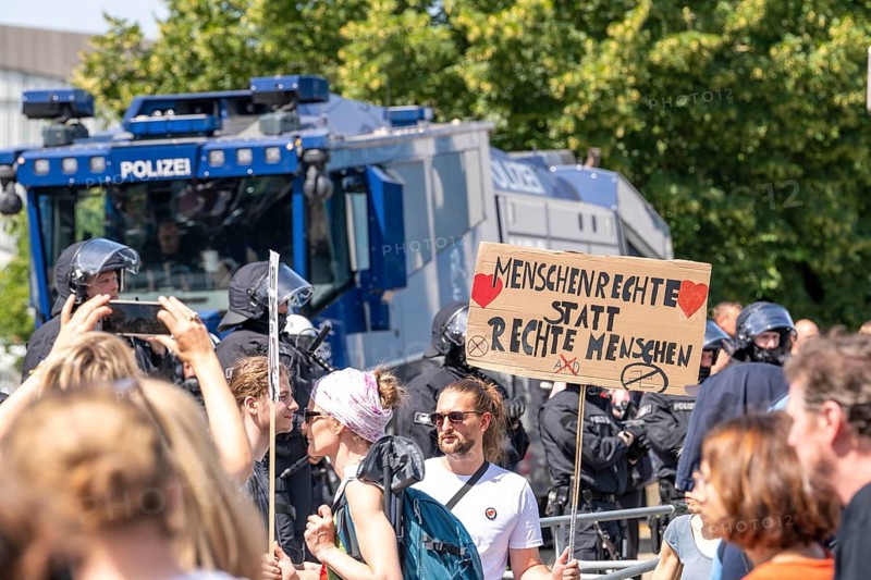 Police water cannon at the demonstration against the AFD party conference in Essen, several tens of thousands of demonstrators marched from the main railway station to the Grugahalle and on to a rally, Essen, North Rhine-Westphalia, Germany, Europe