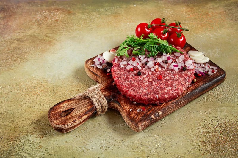 Raw cutlets, for burgers, minced meat, handmade, homemade, with spices, top view, no people