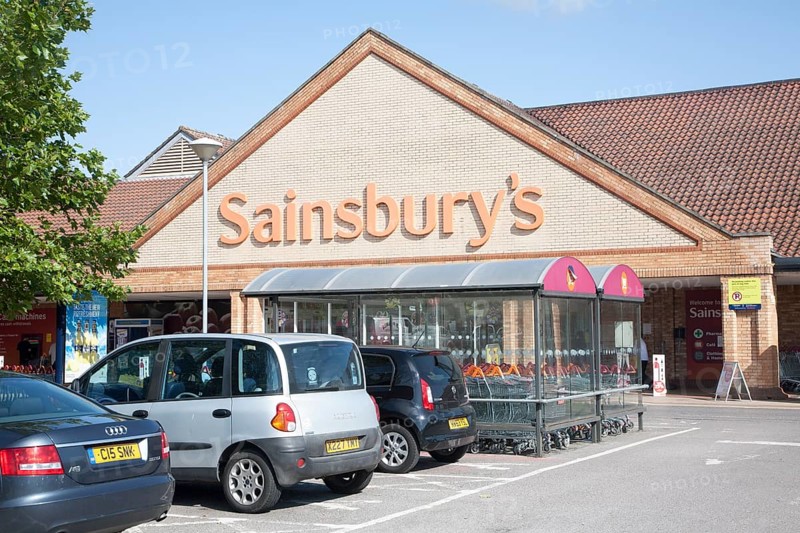 Cars parked at Sainsbury's supermarket store, Chippenham, Wiltshire, England, UK