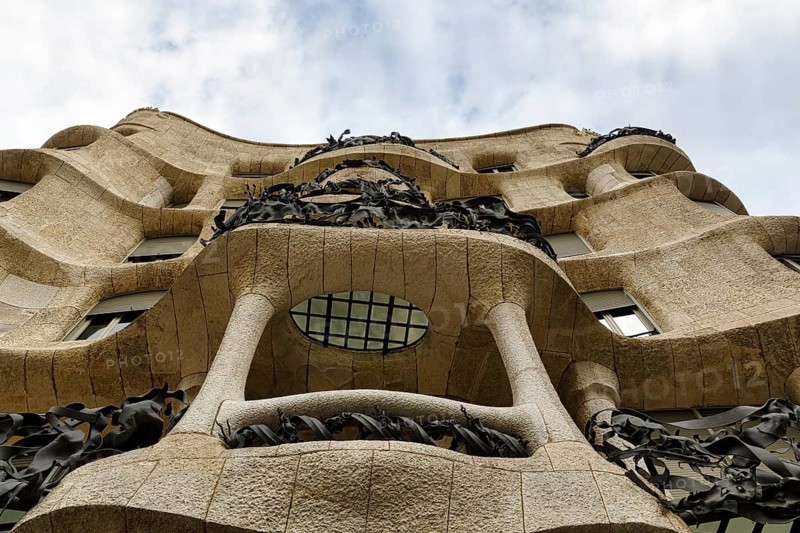 Artfully designed façade, balconies with wrought-iron grilles, view from below, Casa Mila, Casa Milà, La Pedrera, Passeig de Gracia, Barcelona, Spain, Europe