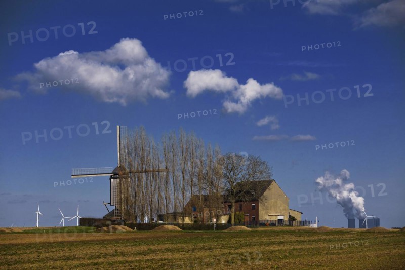Historic Düppelsmühle, trestle windmill on a ridge near Titz in front of the Neurath power station, Düren district, Lower Rhine, North Rhine-Westphalia, Germany, Europe