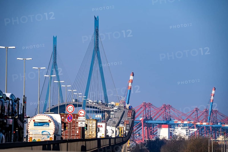 Traffic on the Köhlbrand Bridge in the port of Hamburg, spans the 325 m wide Köhlbrand, an arm of the Süderelbe, the bridge is over 3600 metres long, 53 metres above the water, piers 135 m high, more than 30, 000 vehicles use the B3 bridge daily, important connection to the port, it is dilapidated, to be rebuilt, Hamburg, Germany, Europe