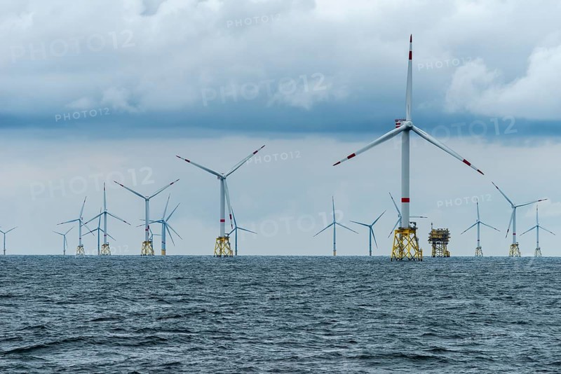 Offshore wind farm Nordsee Ost, operator RWE, north of Helgoland, German economic zone, wind turbines with jacket foundation structure, low swell, supply station, ship tug, Germany, Europe