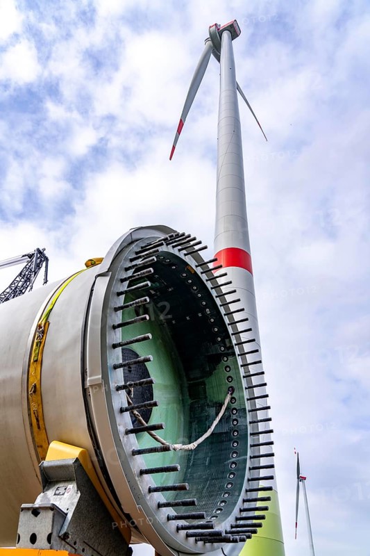 Erection of a wind turbine, wind energy plant, assembly of the third blade, with a crawler lattice crane, wind farm near Hagen, North Rhine-Westphalia, Germany, Europe