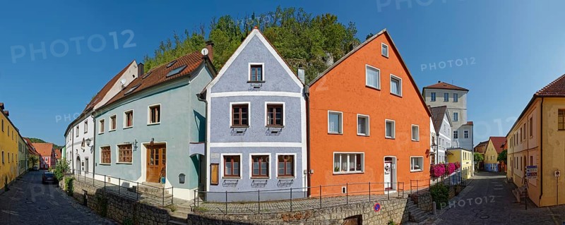Vils alley with colourful houses and clear sky casting shadows, Kallmünz, Upper Palatinate, Bavaria, Germany, Europe