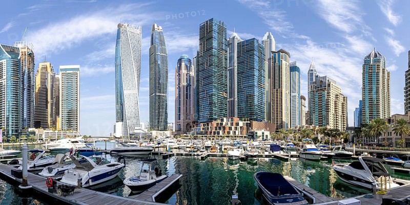 Dubai Marina skyline skyscrapers with yachts property skyscrapers living on the water panorama in Dubai, United Arab Emirates, Asia