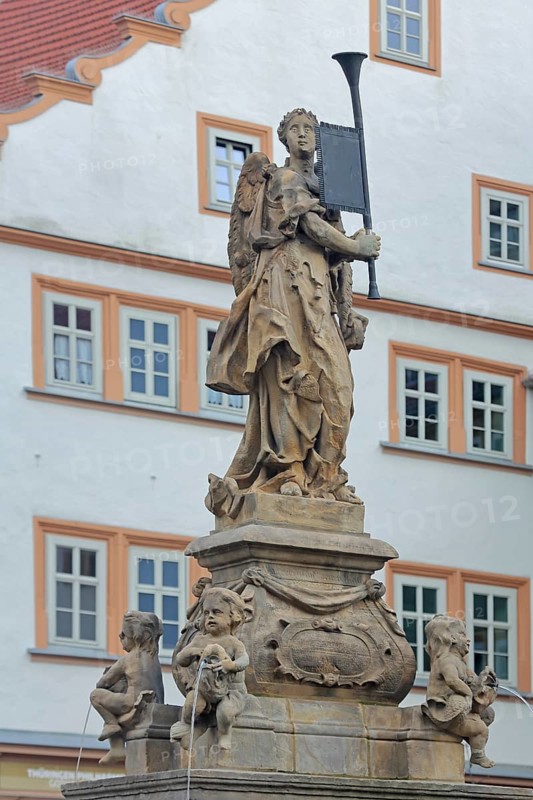 Sculpture at the Schellenbrunnen, trumpet, holding, coat of arms, free-standing, main market, Gotha, Thuringia, Germany, Europe