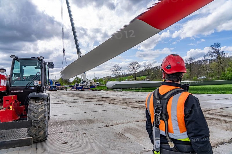 Preparation for the transport of a 68 metre long blade, a wind turbine, with a self-propelled Blade-Lifter vehicle, over a 40 km long route in the Bergisches Land, through towns, villages, over country roads, narrow through roads, to the construction site of the wind turbine near Hagen, North Rhine-Westphalia, Germany, Europe