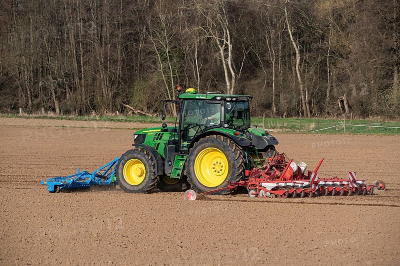 Sugar beet being sown in spring, precision sowing with precision seed drill, behind a tractor, Niederkrüchten, North Rhine-Westphalia, Germany, Europe