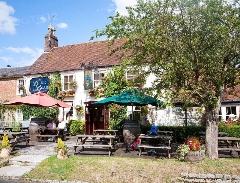 The historic Blue Boar pub on the village green in Aldbourne, Wiltshire, England, United Kingdom, Europe