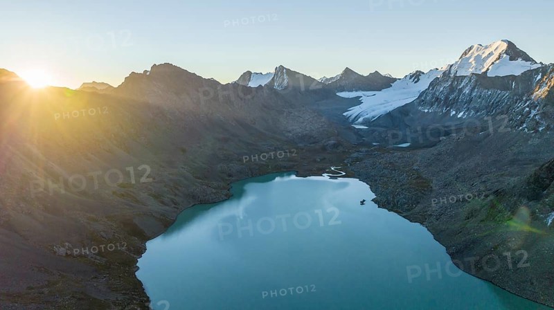 Evening mood, mountain panorama, aerial view, 4000 metre peak with glacier, mountain pass and mountain lake Ala-Kul Lake, Tien Shan, Kyrgyzstan, Asia