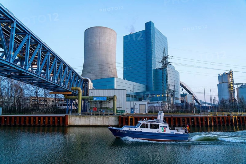 The Datteln 4 coal-fired power plant, operated by Uniper, on the Dormtund-Ems Canal, it is scheduled to go online in summer 2020 after the coal compromise, Datteln, Germany, water police boat, patrol on the canal, Europe