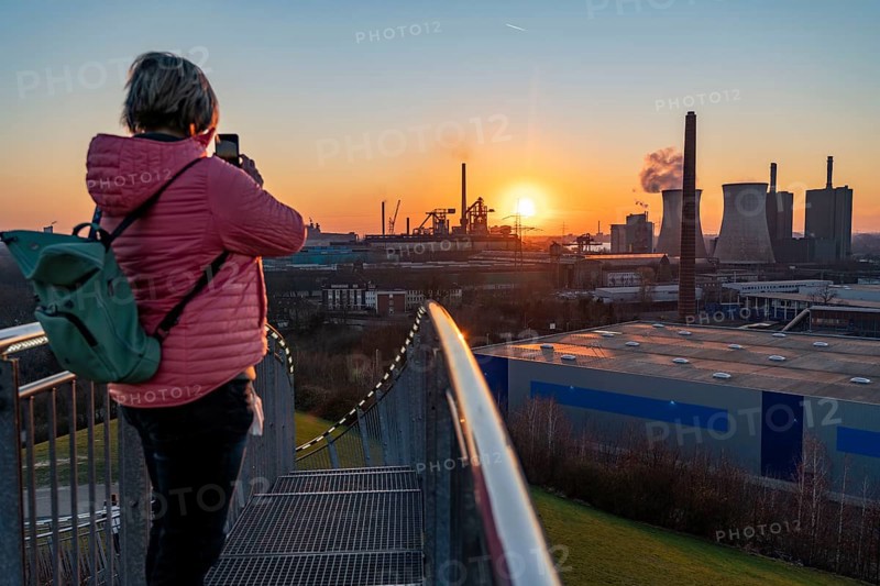 Landmark Angerpark Tiger & Turtle, Magic Mountain, walk-in sculpture in the form of a rollercoaster on the Heinrich-Hildebrand-Höhe spoil tip, HKM steelworks, sunset, Duisburg, North Rhine-Westphalia, Germany, Europe