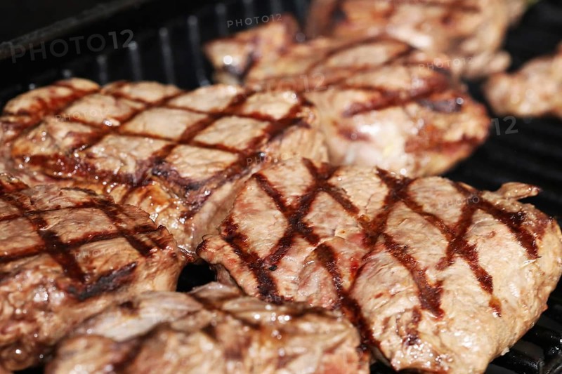 Steak on the grill with diamond pattern