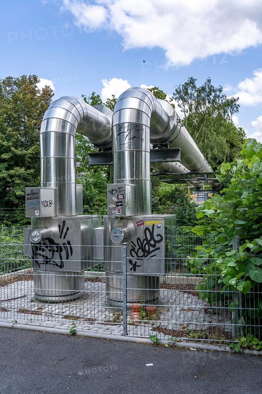 New STEAG district heating pipeline in Essen, over the railway tracks of the S6 line in Essen-Süd, part of the new 12 km long eastern route through the city, North Rhine-Westphalia, Germany, Europe