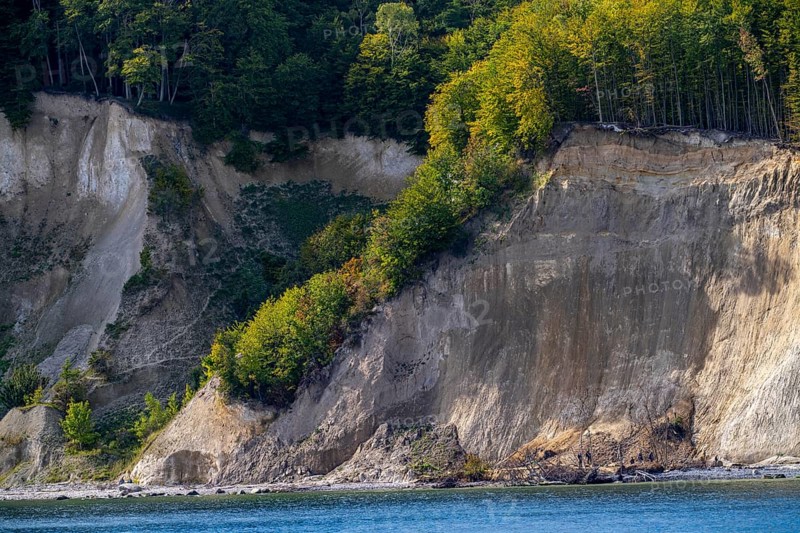The chalk cliffs of Rügen, cliffs of the Stubbenkammer, in the Jasmund National Park, hiker on the beach, the chalk cliffs coast, between Sassnitz and Lohme, Mecklenburg-Vorpommern, Germany, Europe