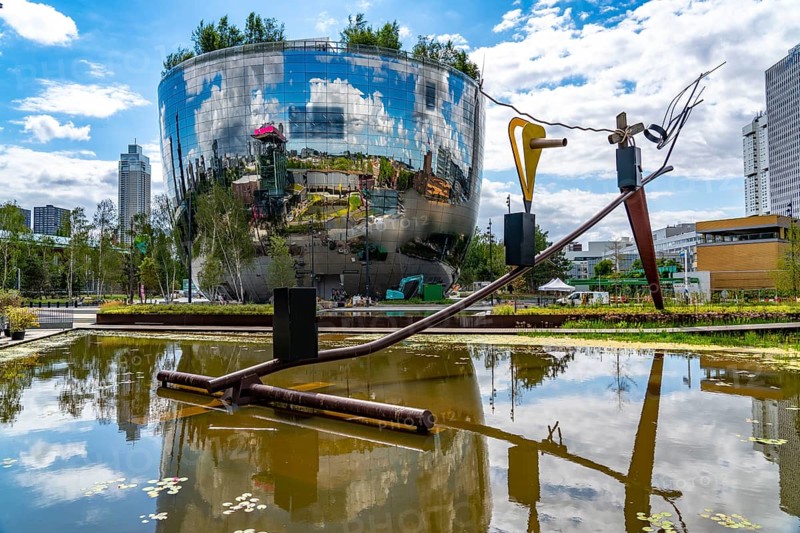 The Boijmans Van Beuningen depot in Rotterdam, show depot of the Boijmans Van Beuningen art museum, over 15, 000 exhibits that are not on display in the museum are presented here, exterior façade with 1664 curved reflective glass panes, birch forest on the roof, Netherlands