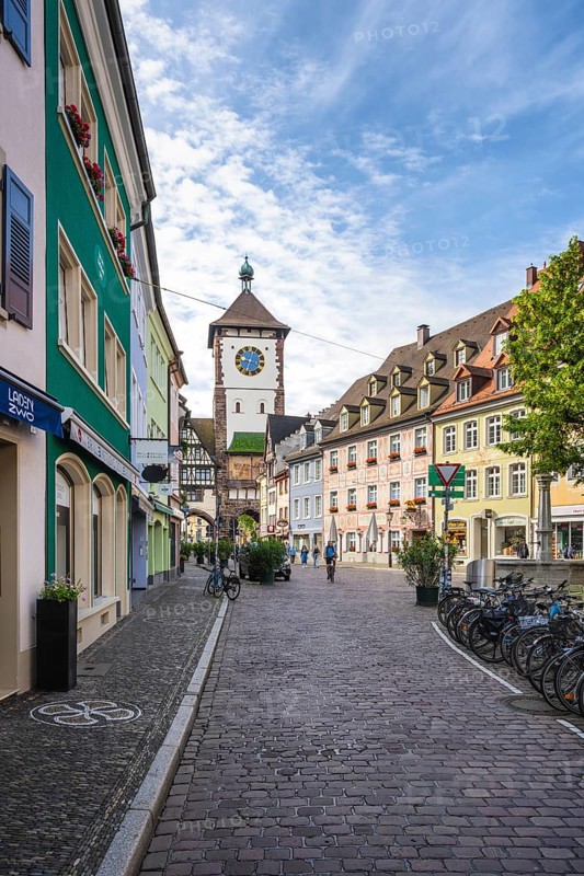 Herrenstraße with the Schwabentor, medieval city gate in the historic city centre of Freiburg im Breisgau, Baden-Württemberg, Germany, Europe