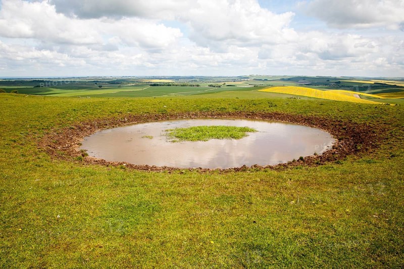 Dew pond water supply on the top of Tan Hill, All Cannings, Wiltshire, England, United Kingdom, Europe