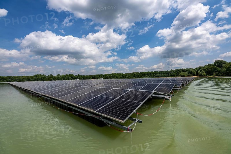 Germany's largest floating solar power plant on the Silbersee III, a quarry pond no longer used for sand mining, near Haltern am See, operated by Quarzwerke GmbH, around 5800 solar modules, on an area of a good 2 football pitches, generate 3.1 megawatts of power, the company uses the electricity itself on weekdays, at weekends it flows into the public grid, North Rhine-Westphalia, Germany, Europe
