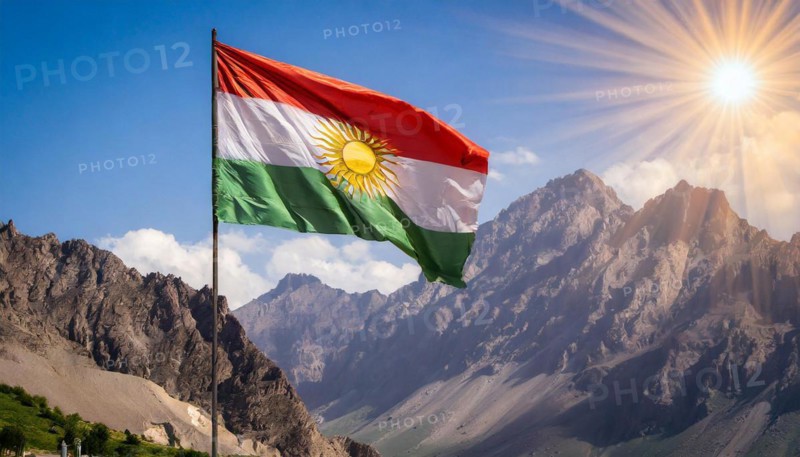 The flag of Kurdistan flutters in the wind