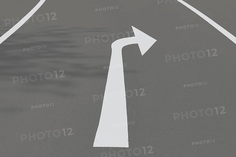 Road with arrow pointing to the right