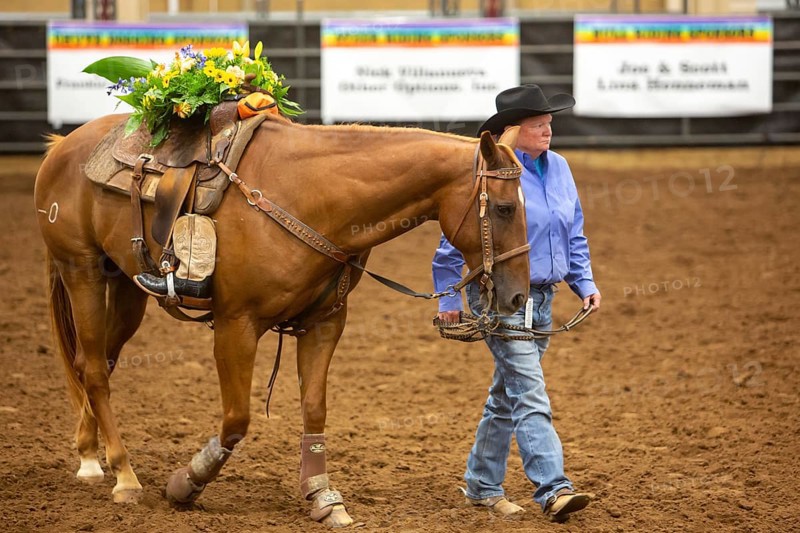 Oklahoma City, Oklahoma, The Great Plains Rodeo, an annual gay rodeo that features traditional rodeo competition while emphasizing the camaraderie of the LGBTQ community. A horse without a rider is led around the arena in honor of Paul Boyd, the recently-deceased president and rodeo director of the Great Plains Rodeo Association
