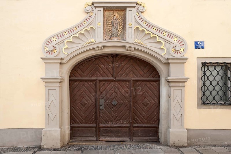 Entrance portal of the Old Dechantei of the Old Chapel with relief of the Virgin and Child, late Gothic from 1464, Kapellengasse 6, Regensburg, Upper Palatinate, Bavaria, Germany, Europe