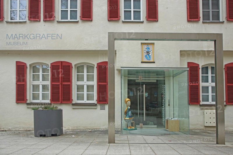 House wall with shutters and entrance to the Margrave Museum, window, glass wall, inscription, figure, Ansbach, Middle Franconia, Franconia, Bavaria, Germany, Europe