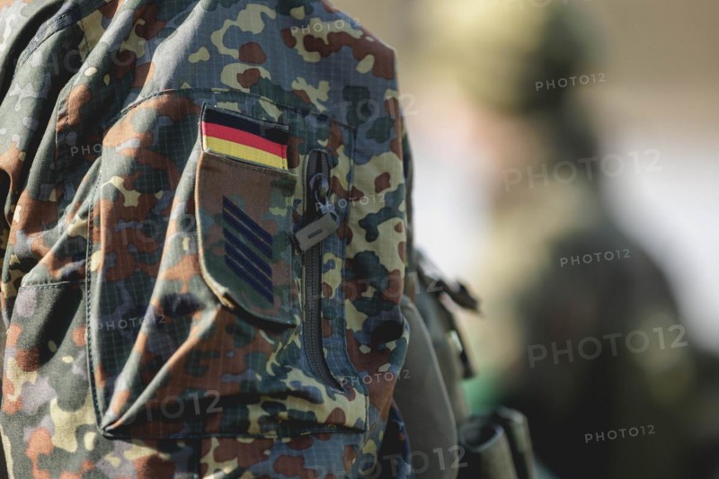 Insignia and rank on the uniform of a Bundeswehr soldier, taken during the military exercise 'Wettiner Schwert' near Tangermünde, 26.03.2024. 'Wettiner Schwert' is part of the Quadriga exercise of the Bundeswehr and the NATO large-scale manoeuvre Steadtfast Defender 2024