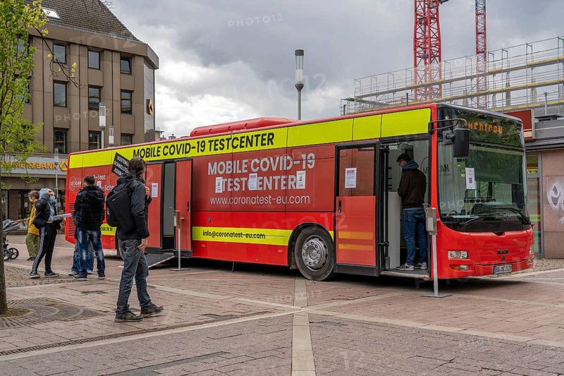 Mobile test centre for Corona rapid tests, in a bus, in the city centre of Bochum, North Rhine-Westphalia, Germany, Europe