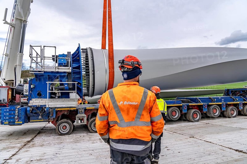 Preparation for the transport of a 68 metre long blade, a wind turbine, with a self-propelled Blade-Lifter vehicle, over a 40 km long route in the Bergisches Land, through towns, villages, over country roads, narrow through roads, to the construction site of the wind turbine near Hagen, North Rhine-Westphalia, Germany, Europe