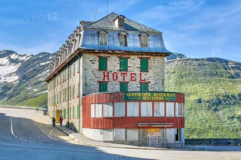 Photo with HDR effect of abandoned former now closed historic Hotel Gletscher-Restaurant Belvedere on Furka pass road mountain road alpine pass Furka Pass, Alps, Canton Valais, Switzerland, Europe
