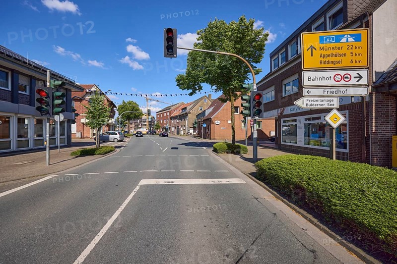 Weseler Strasse with signposts to the Buldener See leisure centre, cemetery, Münster railway station, Appelhülsen and Hiddingsel in the Buldern district, Dülmen, Münsterland, Coesfeld district, North Rhine-Westphalia, Germany, Europe