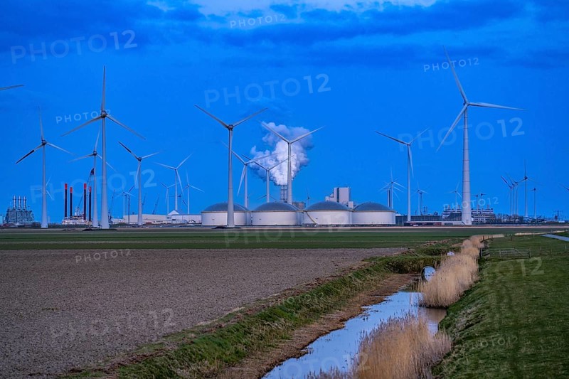 Vopak tank terminal in the industrial harbour of Eemshaven, RWE coal-fired power plant Eemshavencentrale, wind farm, Groningen, Netherlands