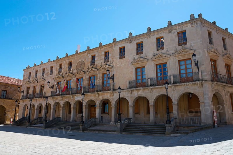 Historic building with several balconies and flags in front of a blue sky, Ayuntamiento, Town Hall, Soria, Castilla y León, Leon, Spain, Europe