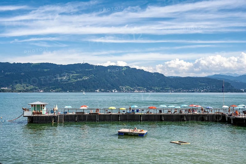 View over the marina of Lindau across Lake Constance to Bregenz and the 1062 m high mountain Pfänder, Swabia, Germany, Europe